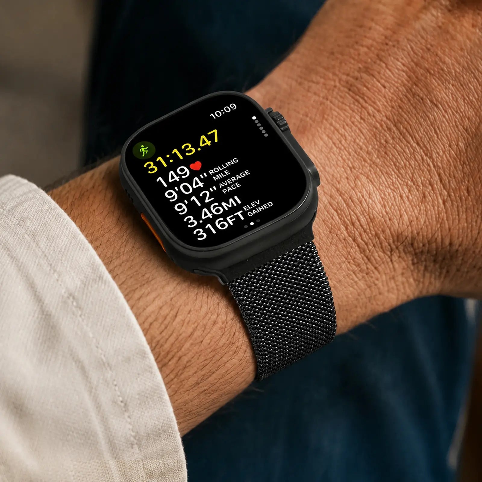 Person wearing a black smartwatch