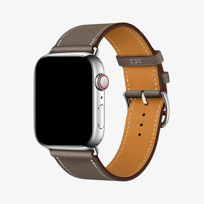 Smartwatch with brown leather strap on a white background