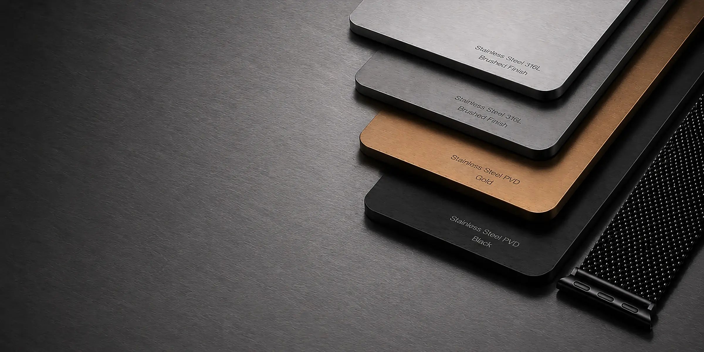 Set of metallic color swatches on a dark textured surface