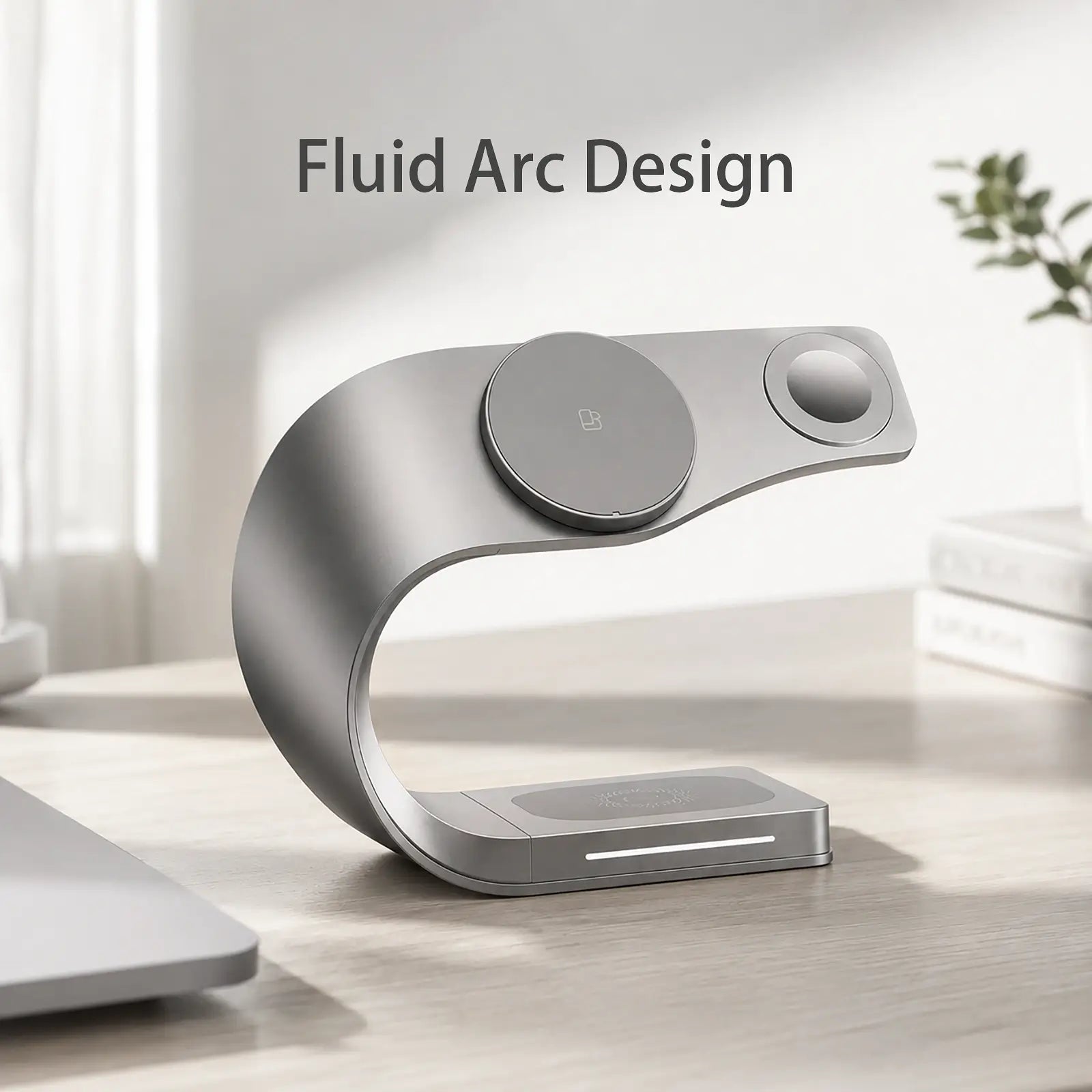 Modern wireless charging pad with 'Fluid Arc Design' text on a light background