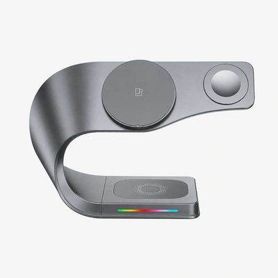 Gray electronic device with wireless charging pad on a white background
