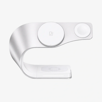 White electronic device with circular components on a light gray background