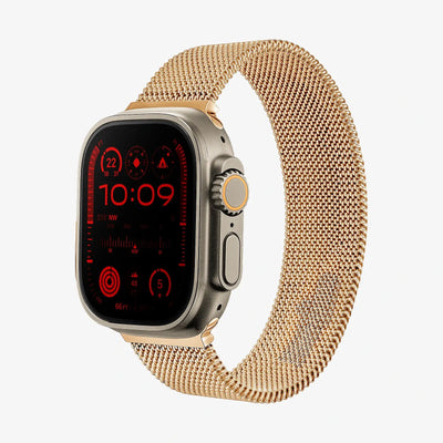 Smartwatch with a gold mesh band on a white background