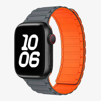 Smartwatch with a black case and orange band on a light gray background