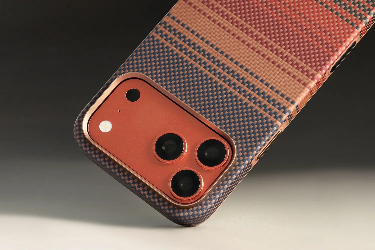 Phone case with a textured pattern on a dark background